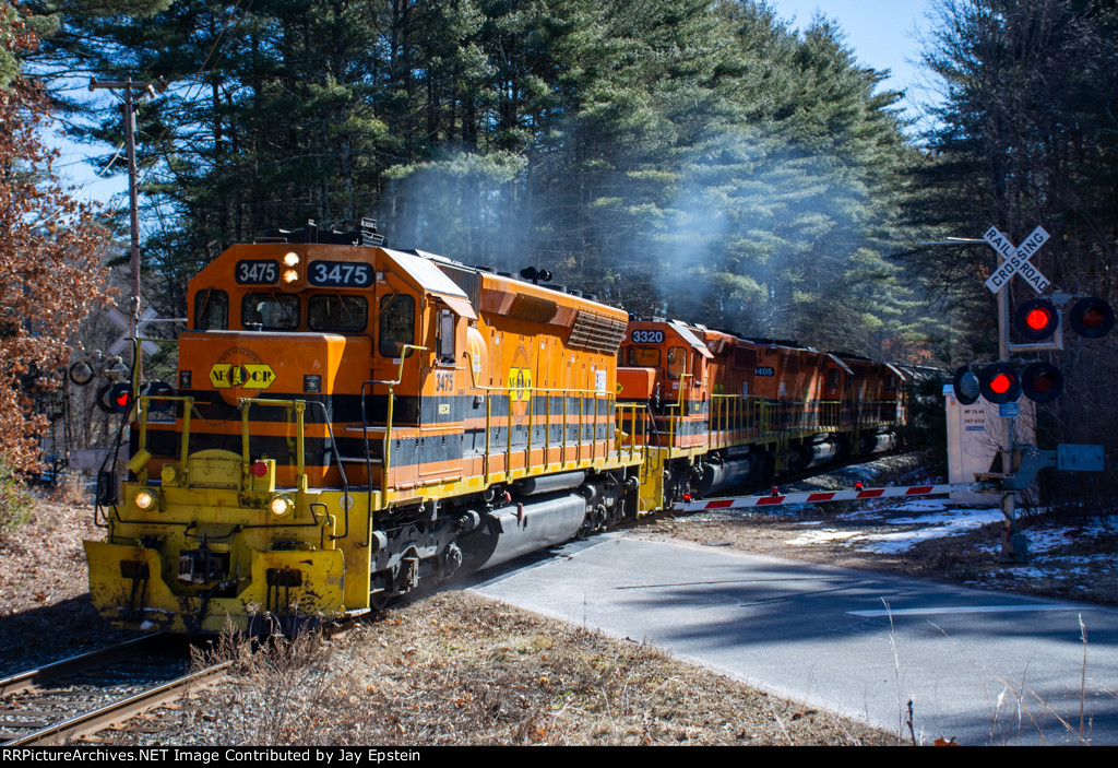 611 roars north over Bardwell Street